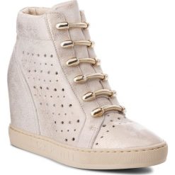 Sneakersy CARINII - B4304 F76-000-000-B88. Żółte półbuty damskie Carinii, na co dzień, bez wzorów, ze skóry, bez obcasa, na koturnie, bez zapięcia. W wyprzedaży za 249,00 zł.