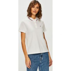 Tommy Jeans - Top. Białe bluzki damskie Tommy Jeans, s, bez wzorów, z bawełny, bez kołnierzyka. W wyprzedaży za 159,90 zł.