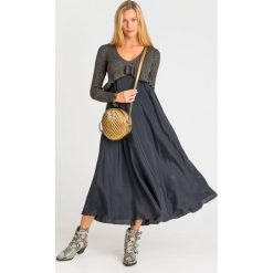 SUKIENKA TWINSET. Czarne sukienki damskie Twinset, na imprezę, xs, z aplikacjami, z dzianiny, bez kołnierzyka, bez rękawów, maxi. Za 564,50 zł.