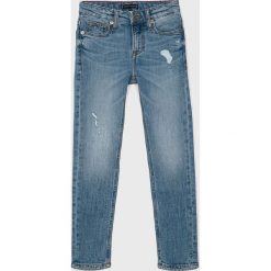 Tommy Hilfiger - Jeansy dziecięce 128-176 cm. Niebieskie spodnie chłopięce TOMMY HILFIGER, z aplikacjami, z elastanu, z podwyższonym stanem. Za 299,90 zł.