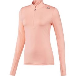 Bluza do biegania damska REEBOK RUNNING ESSENTIALS 1/4 ZIP / BQ7477. Różowe bluzy damskie Reebok, bez wzorów, z materiału, bez rękawów, bez kaptura. Za 139,00 zł.