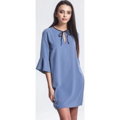 Niebieska Sukienka Serious. Niebieskie sukienki damskie marki other, na imprezę, s, bez wzorów, z falbankami, bez rękawów, mini. Za 79,99 zł.