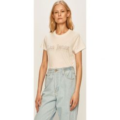Lee - T-shirt. Białe topy damskie Lee, s, z nadrukiem, z bawełny, z okrągłym kołnierzem. W wyprzedaży za 49,90 zł.