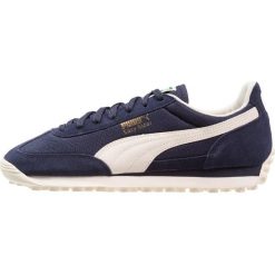 Puma EASY RIDER CLASSIC Tenisówki i Trampki peacoat/whisper white/gold. Niebieskie tenisówki męskie Puma, z materiału. Za 359,00 zł.