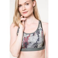 Reebok - Biustonosz. Zielone biustonosze sportowe damskie Reebok, xs, bez wzorów, z elastanu. W wyprzedaży za 79,90 zł.