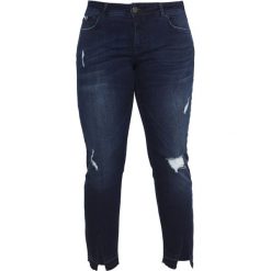 Zizzi CROPPED EMILY Jeansy Slim Fit dark blue denim. Niebieskie jeansy damskie relaxed fit marki Zizzi, z bawełny. W wyprzedaży za 341,10 zł.
