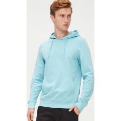 Bluza basic z kapturem - Niebieski. Niebieskie bluzy damskie Cropp, s. Za 79,99 zł.