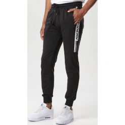 Czarne Spodnie Vivielora. Czarne spodnie męskie Born2be, xl, bez wzorów, z dresówki. W wyprzedaży za 59,99 zł.