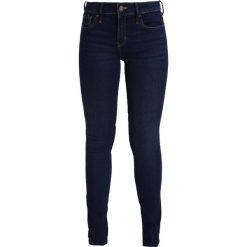 Hollister Co. Jeans Skinny Fit dark blue denim. Niebieskie rurki damskie marki Hollister Co. W wyprzedaży za 188,10 zł.