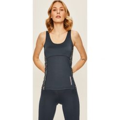 Femi Stories - Top Indu. Różowe topy damskie Femi Stories, s, bez wzorów, z poliesteru, z okrągłym kołnierzem. Za 179,90 zł.
