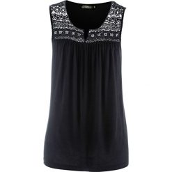 Top dzianinowy z koronką bonprix czarny. Czarne bluzki damskie bonprix, w koronkowe wzory, z dzianiny, bez kołnierzyka, bez rękawów. Za 54,99 zł.
