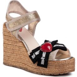 Espadryle LOVE MOSCHINO - JA1609BI0AJJ0900 Glitter Platino. Żółte espadryle damskie Love Moschino, z aplikacjami, ze skóry ekologicznej, bez obcasa, na obcasie. Za 1239,00 zł.
