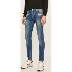 Iceberg - Jeansy Tasche. Niebieskie jeansy męskie Iceberg, bez wzorów. W wyprzedaży za 499,90 zł.
