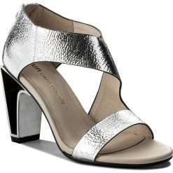 Sandały UNITED NUDE - Icon Flow 10288141113 Silver. Szare klapki damskie United Nude, bez wzorów, ze skóry, bez obcasa, na obcasie. W wyprzedaży za 599,00 zł.