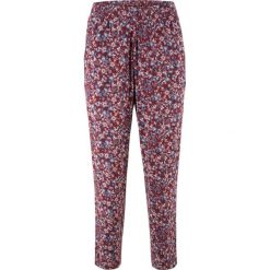 Spodnie z dżerseju 7/8 bonprix czerwony kasztanowy w kwiaty. Czerwone spodnie damskie bonprix, z dżerseju. Za 37,99 zł.