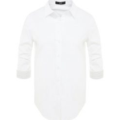 Steffen Schraut NYOKO ESSENTIAL GLAM BLOUSE Koszula white. Białe koszule damskie marki Steffen Schraut, z elastanu. Za 749,00 zł.
