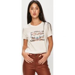 Levi's - T-shirt. Białe bluzki damskie Levi's®, s, z nadrukiem, z bawełny, z okrągłym kołnierzem. Za 129,90 zł.