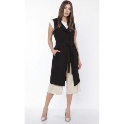 Kamizelka damska elegancka czarna. Czarne kamizelki damskie e-margeritka.pl, s, bez wzorów, z poliesteru, eleganckie, długie, bez kaptura. Za 139,99 zł.