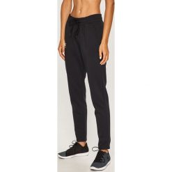 Under Armour - Spodnie. Czarne spodnie damskie Under Armour, s, z bawełny. W wyprzedaży za 159,90 zł.