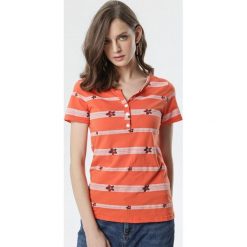 Pomarańczowy T-shirt Kalise. Pomarańczowe bluzki damskie Born2be, s, w paski, z okrągłym kołnierzem. Za 39,99 zł.