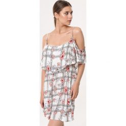 Biała Sukienka Blossoms. Białe sukienki dziewczęce Born2be, na lato, w kwiaty, bez rękawów, mini. Za 59,99 zł.