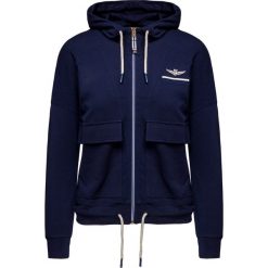 Bluza z kapturem AERONAUTICA MILITARE. Białe bluzy damskie Aeronautica Militare, z aplikacjami, z tkaniny, bez rękawów, z kapturem. Za 1100,00 zł.