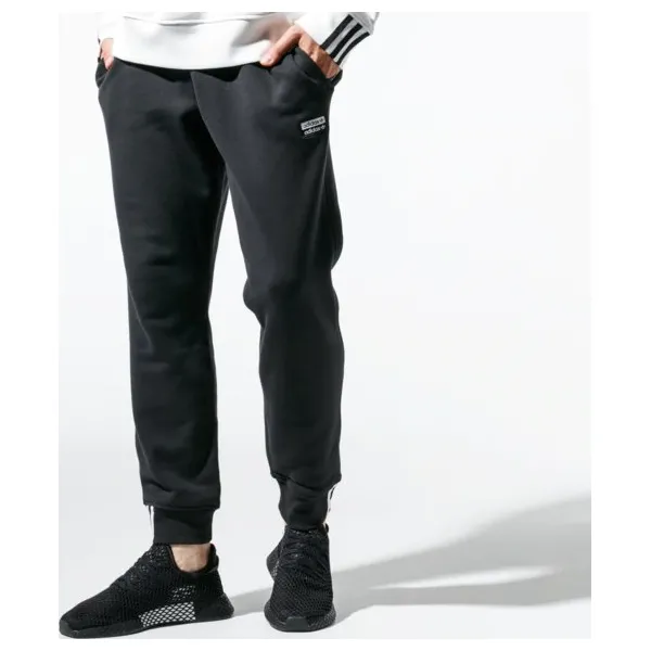 Adidas Spodnie Vocal Sweatpant , czarny, rozmiar L. Czarne spodnie męskie Adidas, m, bez wzorów, z materiału, klasyczne. Za 279,99 zł.