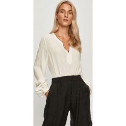 Tommy Hilfiger - Bluzka. Białe bluzki damskie TOMMY HILFIGER, na co dzień, z aplikacjami, z wiskozy, eleganckie, bez kołnierzyka, z długim rękawem. Za 399,90 zł.