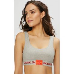 Calvin Klein Underwear - Biustonosz. Szare biustonosze sportowe marki Calvin Klein Underwear, s, z elastanu. Za 139,90 zł.