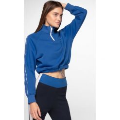Bluza damska BLD264 - kobalt. Bluzy damskie xl, bez wzorów, z dzianiny, z krótkim rękawem, krótkie, bez kaptura. W wyprzedaży za 59,99 zł.