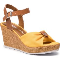 Sandały TAMARIS - 1-28341-22 Sun/Cognac 634. Żółte klapki damskie Tamaris, bez wzorów, ze skóry ekologicznej, bez obcasa, na obcasie. W wyprzedaży za 179,00 zł.
