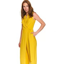 Elegancki kombinezon damski. Żółte kombinezony damskie Top Secret, na zimę, bez wzorów, z tkaniny, eleganckie, z dekoltem w serek, z długim rękawem, długie. W wyprzedaży za 99,99 zł.