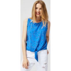 Top z wiązaniem. Niebieskie bluzki damskie Moodo, xs, bez wzorów, bez kołnierzyka, bez rękawów. Za 19,99 zł.