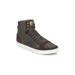 Buty Hummel TEN STAR MONO OILED IG. Pomarańczowe trampki i tenisówki damskie Hummel, bez wzorów, retro, bez zapięcia. Za 307,30 zł.