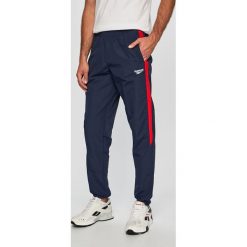 Reebok Classic - Spodnie. Niebieskie spodnie męskie Reebok Classic, na co dzień, s, bez wzorów, z bawełny, casualowe. W wyprzedaży za 199,90 zł.