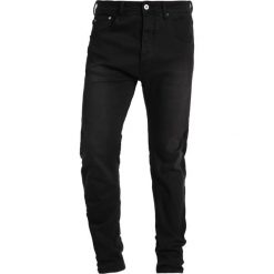 Cristiano Ronaldo CR7 Jeansy Slim Fit ebony. Niebieskie jeansy męskie marki Cristiano Ronaldo CR7, z elastanu. W wyprzedaży za 239,20 zł.