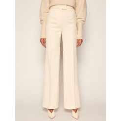 Spodnie materiałowe Victoria Victoria Beckham Stretch 2320WTR001480C. Brązowe spodnie damskie Victoria Victoria Beckham, bez wzorów, z tkaniny. Za 1779,00 zł.