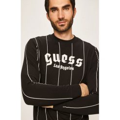 Guess Jeans - Bluza. Czarne bluzy męskie Guess Jeans, s, z aplikacjami, z bawełny, z okrągłym kołnierzem, bez rękawów, bez kaptura. Za 369,90 zł.