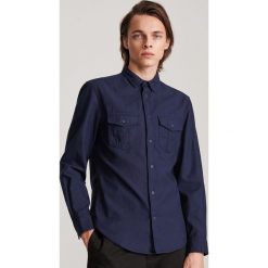 Bawełniana koszula regular fit - Granatowy. Niebieskie koszule męskie Reserved, s, z bawełny. Za 109,99 zł.