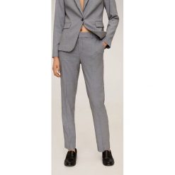 Mango - Spodnie Borecuad. Czarne spodnie damskie Mango, w paski, z elastanu. Za 139,90 zł.
