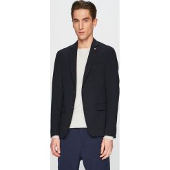 Tommy Hilfiger Tailored - Marynarka. Niebieskie garnitury męskie Tommy Hilfiger Tailored, bez wzorów, z elastanu, klasyczne. W wyprzedaży za 699,90 zł.