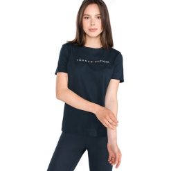 Tommy Hilfiger Koszulka Niebieski. Niebieskie koszulki damskie TOMMY HILFIGER, m, z nadrukiem, z bawełny, bez kołnierzyka, z krótkim rękawem. Za 175,95 zł.