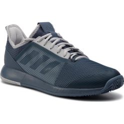 Buty adidas - Defiant Bounce 2 M G26629 Tecink/Tecink/Lgsogr. Niebieskie buty sportowe męskie Adidas, ze skóry ekologicznej, bez zapięcia, tenisowe. Za 399,00 zł.