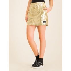 Spódnica trapezowa Calvin Klein Jeans Gold Mettallic J20J212587. Żółte spódniczki damskie Calvin Klein Jeans, xs, bez wzorów, z jeansu, mini, trapezowe. W wyprzedaży za 239,00 zł.