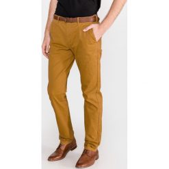Scotch & Soda Stuart Spodnie Brązowy Pomarańczowy. Pomarańczowe spodnie męskie Scotch & Soda, w paski, z elastanu. Za 402,95 zł.