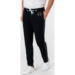 Armani Exchange Spodnie dresowe Niebieski. Niebieskie spodnie męskie Armani Exchange, m, bez wzorów, z elastanu. Za 378,95 zł.