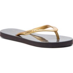 Japonki ARMANI EXCHANGE - XDQ004 XV146 00194 Gold/Dk Grey. Żółte klapki damskie marki Armani Exchange, bez wzorów, z tworzywa sztucznego, bez obcasa. Za 239,00 zł.