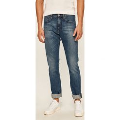 Calvin Klein - Jeansy. Niebieskie jeansy męskie Calvin Klein, z aplikacjami. Za 649,90 zł.