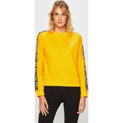 Fila - Bluza. Żółte bluzy damskie Fila, s, z aplikacjami, z bawełny, bez rękawów, bez kaptura. W wyprzedaży za 219,90 zł.