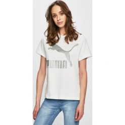 Puma - Top. Zielone bluzki damskie Puma, s, z nadrukiem, z elastanu, casualowe, z okrągłym kołnierzem, z krótkim rękawem. W wyprzedaży za 99,90 zł.